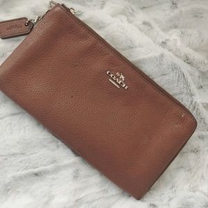 tan coach clutch